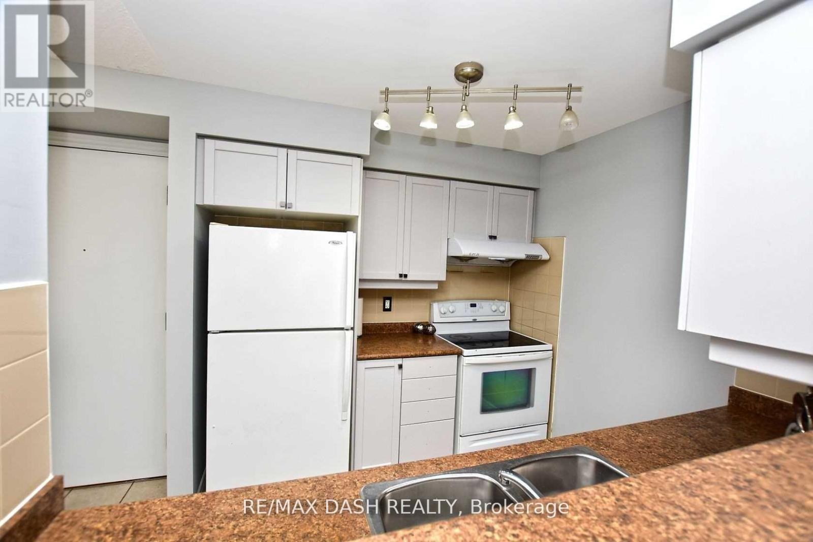 2728 - 700 Humberwood Boulevard, Toronto, ON - Indoor Photo Showing Kitchen With Double Sink