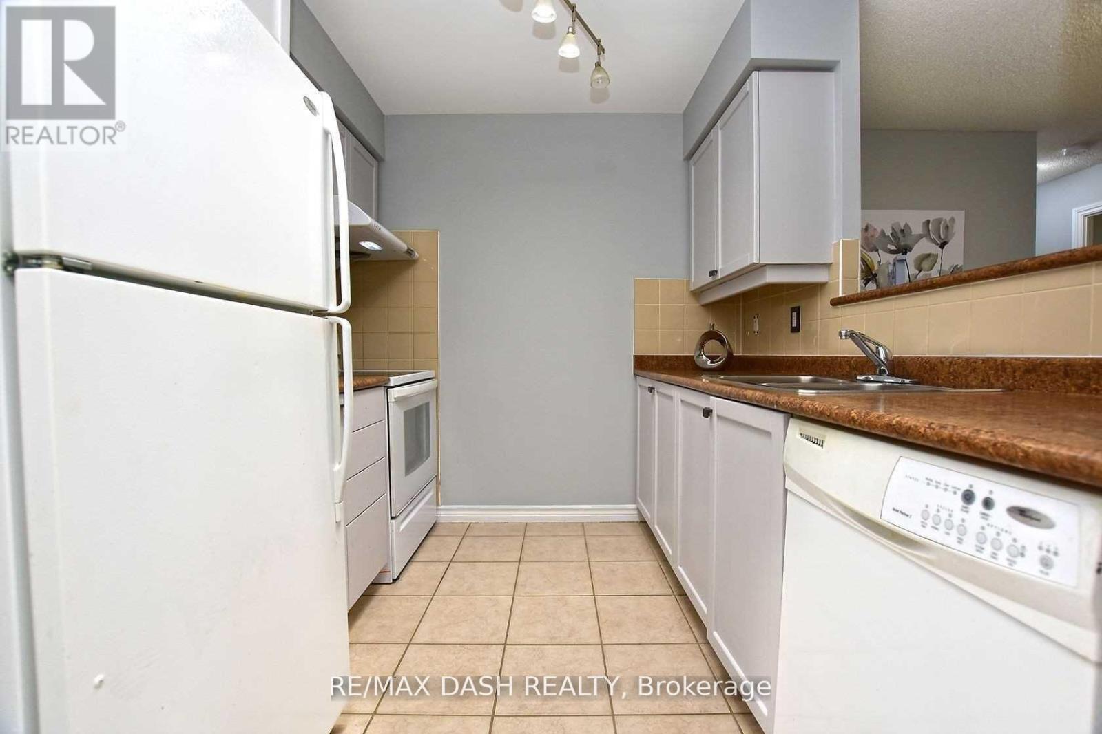 2728 - 700 Humberwood Boulevard, Toronto, ON - Indoor Photo Showing Kitchen With Double Sink