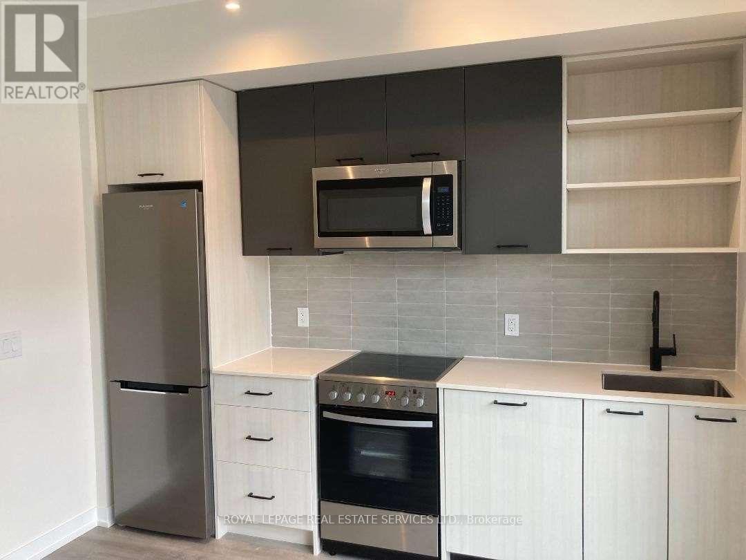 106 - 2300 St Clair Avenue W, Toronto, ON - Indoor Photo Showing Kitchen With Upgraded Kitchen