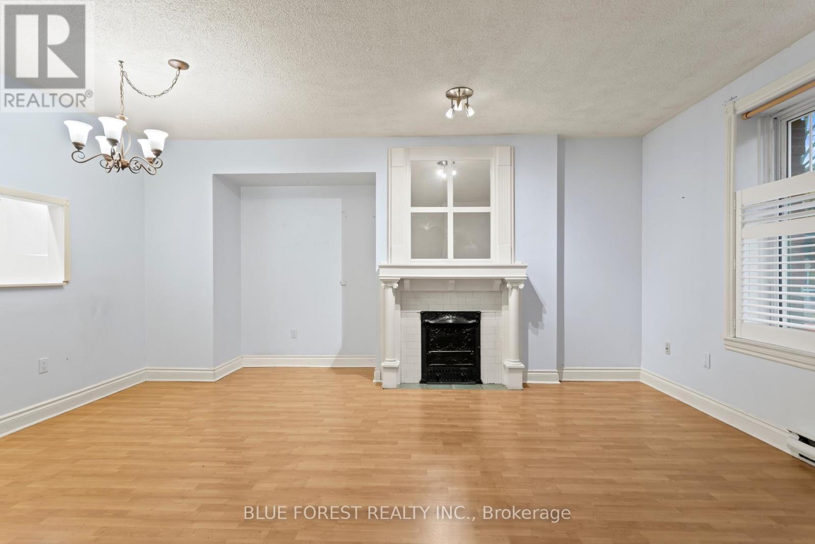 102 - 460 Wellington Street, London East (East F), ON - Indoor Photo Showing Other Room With Fireplace