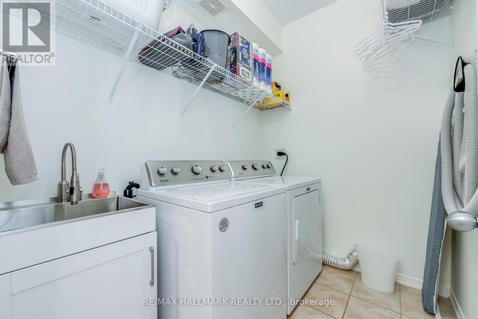 Main Floor Laundry Room - 10 Filmic Lane, Toronto, ON - Indoor Photo Showing Laundry Room
