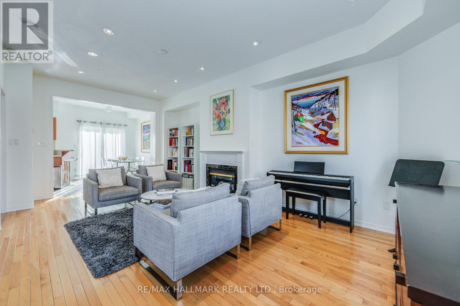 Open Concept - 10 Filmic Lane, Toronto, ON - Indoor Photo Showing Living Room With Fireplace