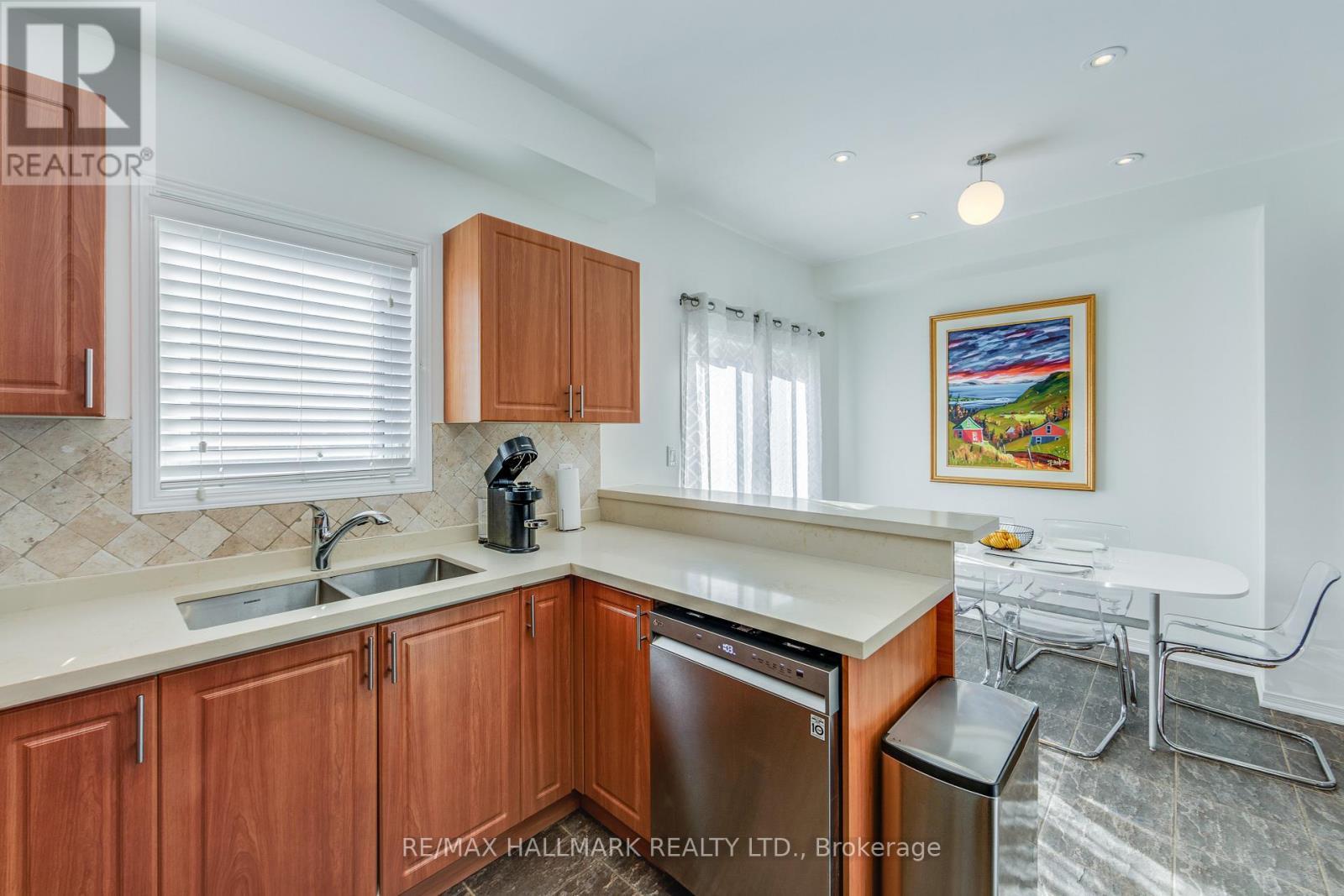 10 Filmic Lane, Toronto, ON - Indoor Photo Showing Kitchen With Double Sink