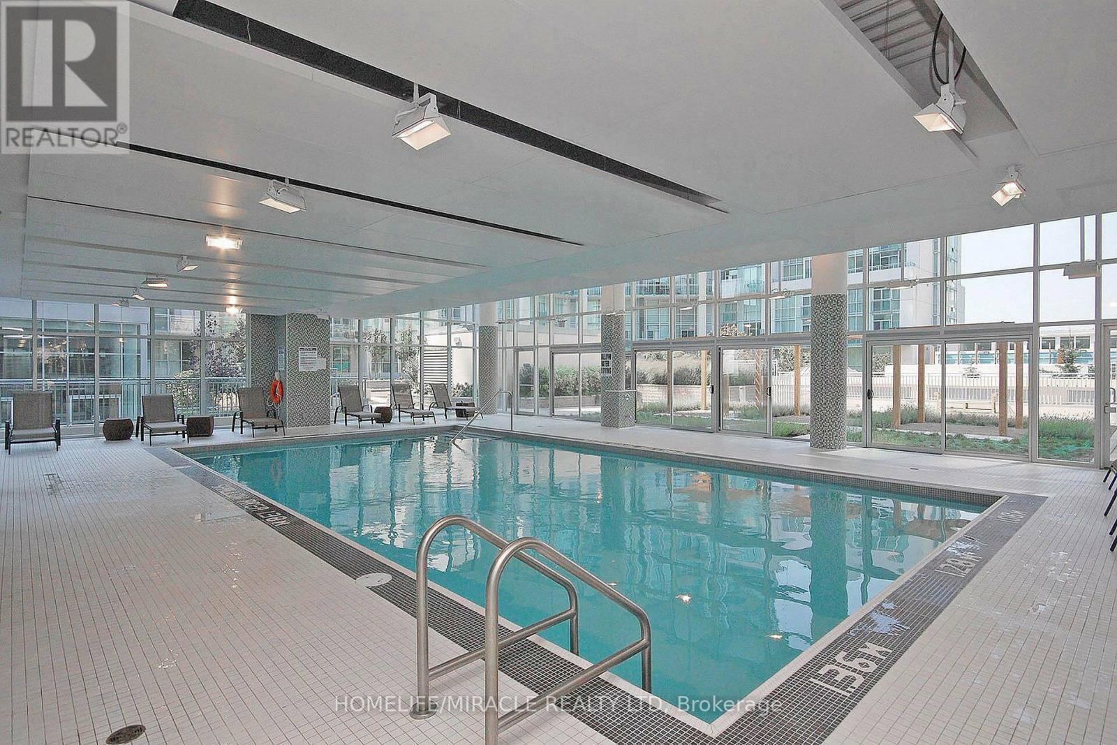 Ph2 - 225 Webb Drive, Mississauga, ON - Indoor Photo Showing Other Room With In Ground Pool