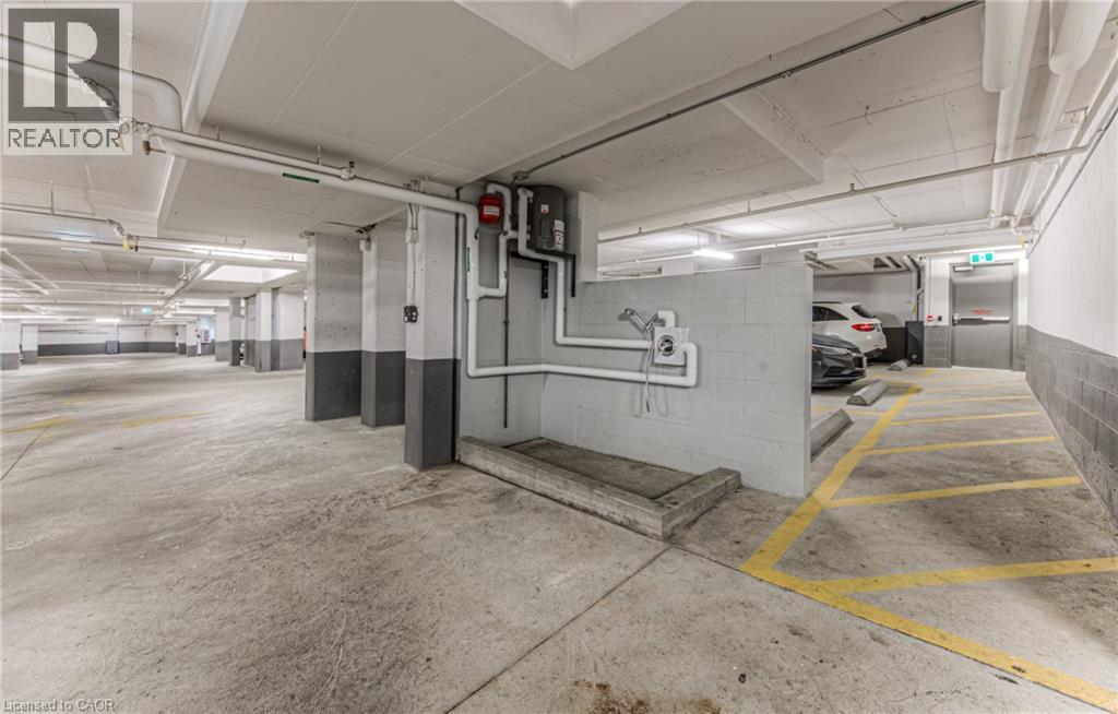 399 Queen Street S Unit# 417, Kitchener, ON - Indoor Photo Showing Garage