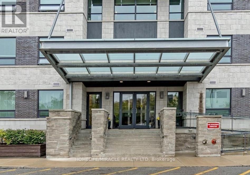 502 - 383 Main Street E, Milton, ON - Outdoor With Facade