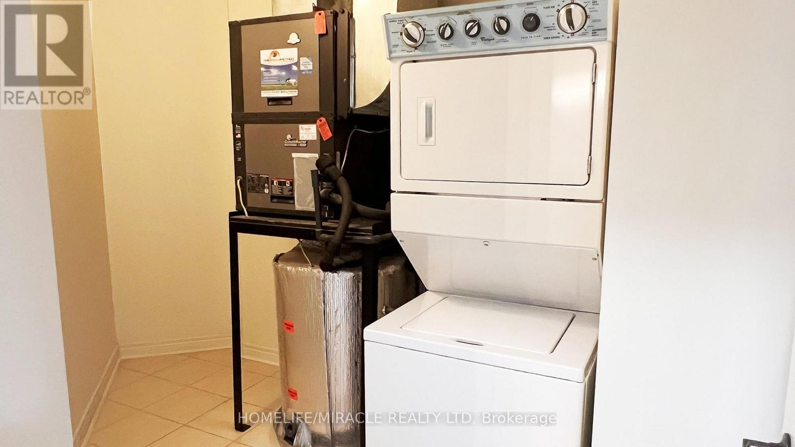 502 - 383 Main Street E, Milton, ON - Indoor Photo Showing Laundry Room
