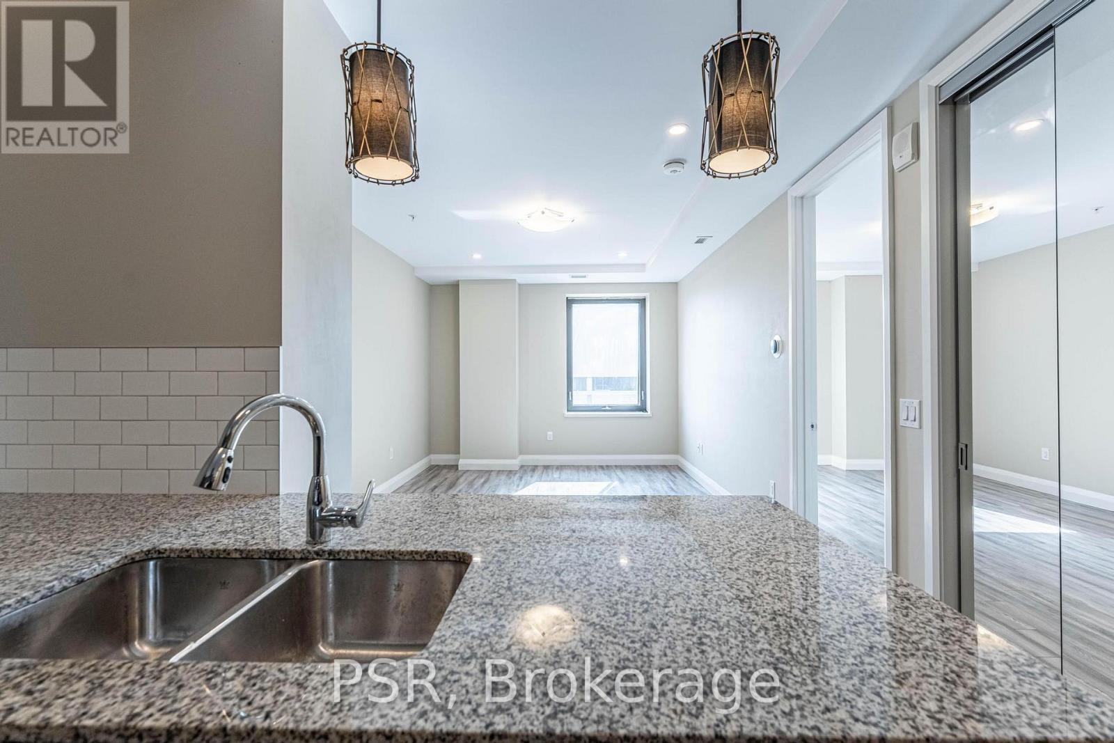 421 - 118 King Street E, Hamilton, ON - Indoor Photo Showing Kitchen With Double Sink