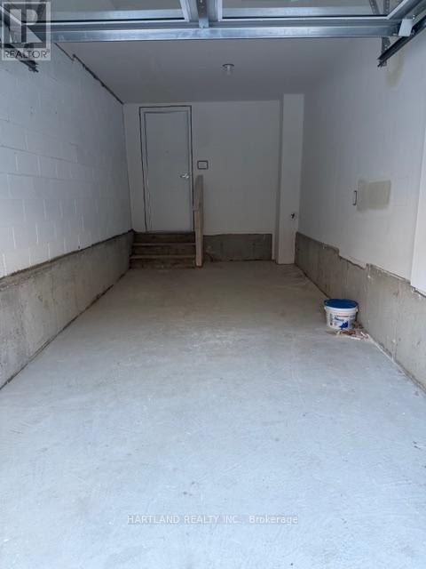 908 - 1695 Dersan Street, Pickering, ON - Indoor Photo Showing Garage