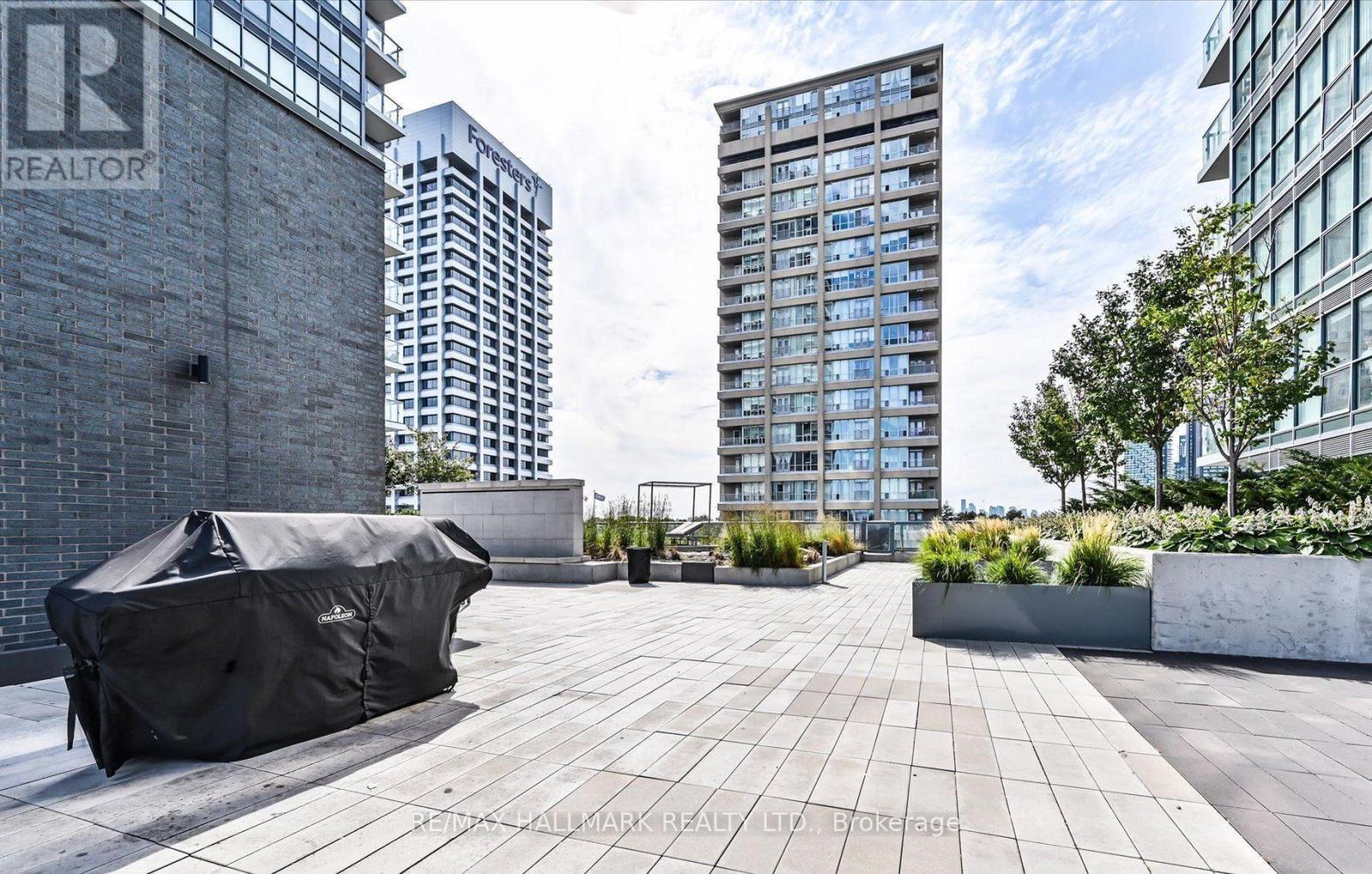 1002 - 6 Sonic Way, Toronto, ON - Outdoor With Facade