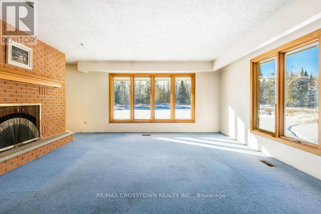 12036 County Rd 27, Springwater, ON - Indoor With Fireplace