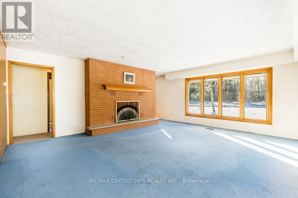12036 County Rd 27, Springwater, ON - Indoor With Fireplace
