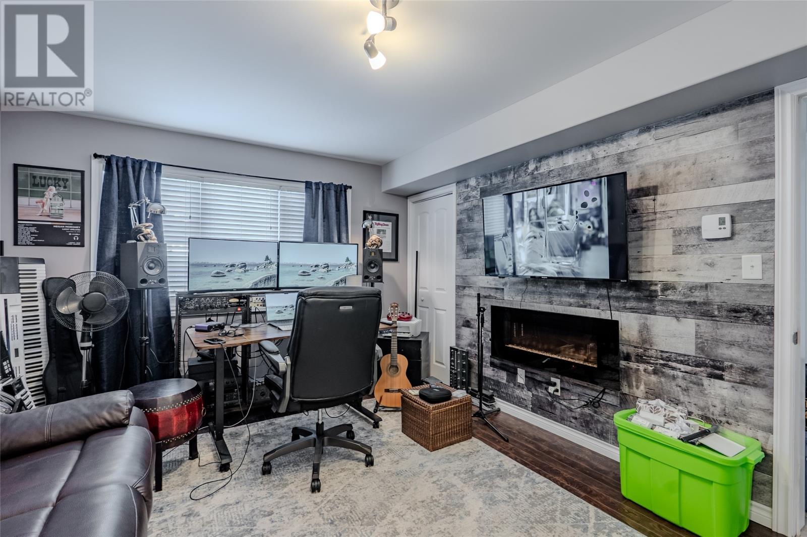 49 Magee Drive, Paradise, NL - Indoor With Fireplace