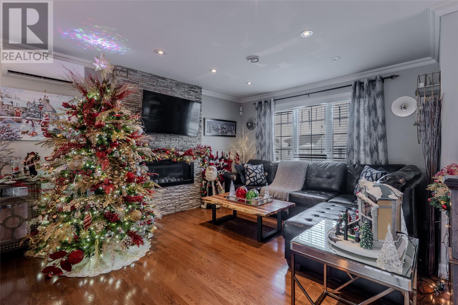 49 Magee Drive, Paradise, NL - Indoor Photo Showing Other Room With Fireplace