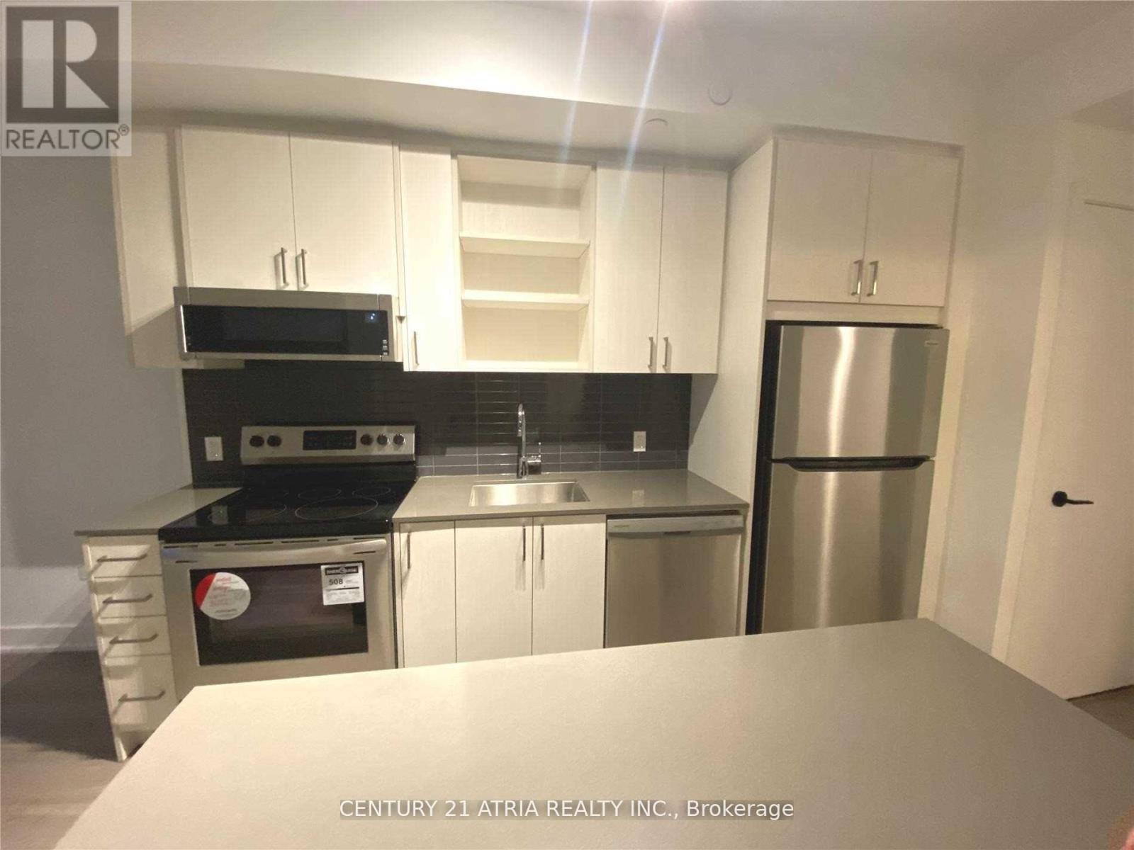 516 - 60 George Butchart Drive, Toronto, ON - Indoor Photo Showing Kitchen