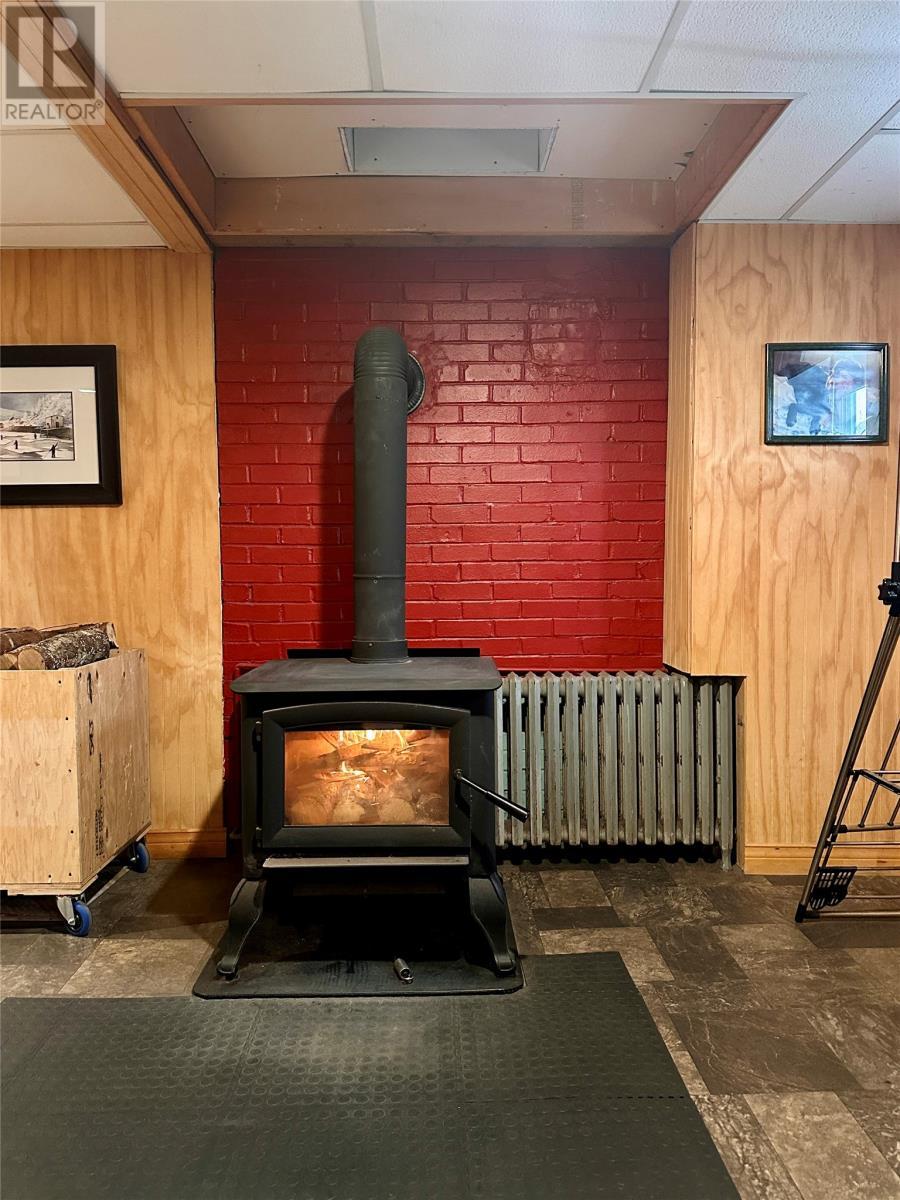 88 Main Road, Lewins Cove, NL - Indoor With Fireplace