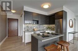 1210 - 36 Park Lawn Road, Toronto, ON - Indoor Photo Showing Kitchen With Upgraded Kitchen