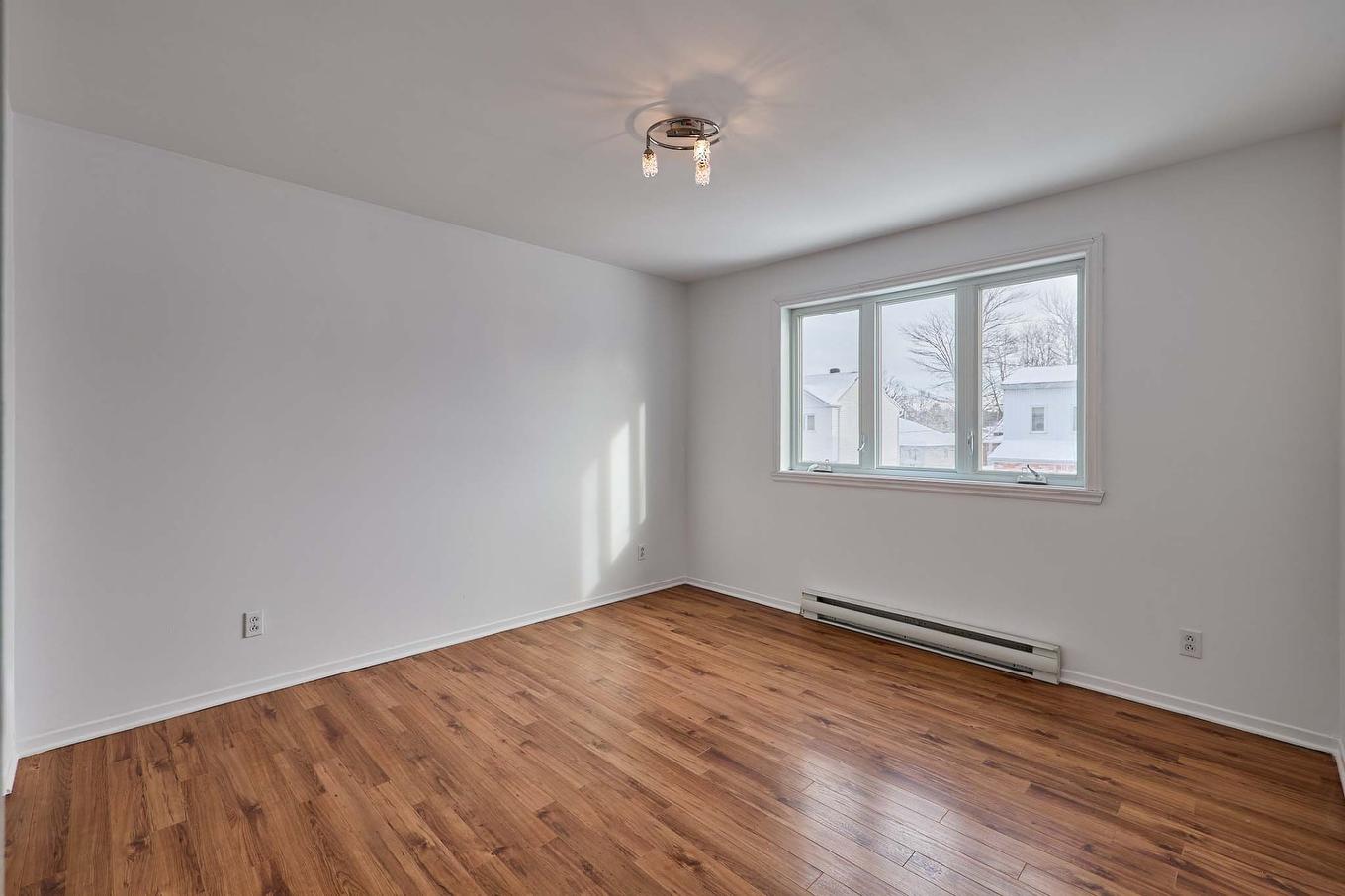 Chambre à coucher principale - 1700 Rue Des Bégonias, Terrebonne (La Plaine), QC - Indoor Photo Showing Other Room