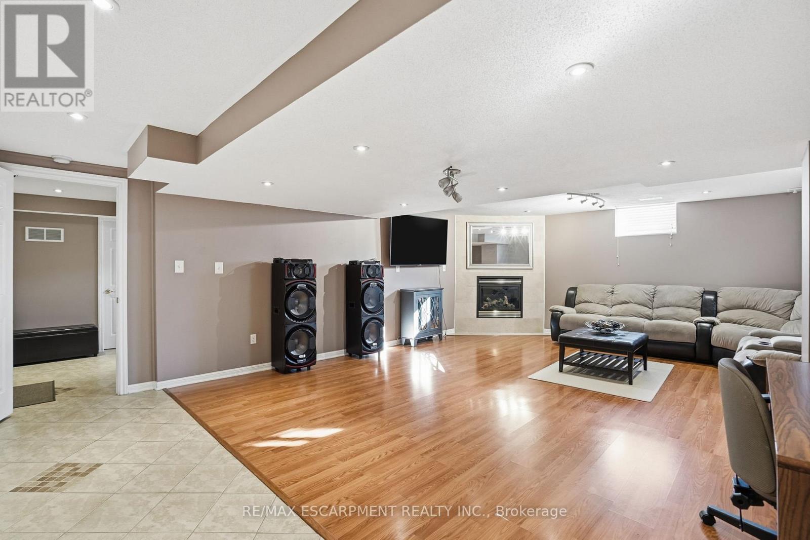 23 Mathews Court, Brantford, ON - Indoor With Fireplace