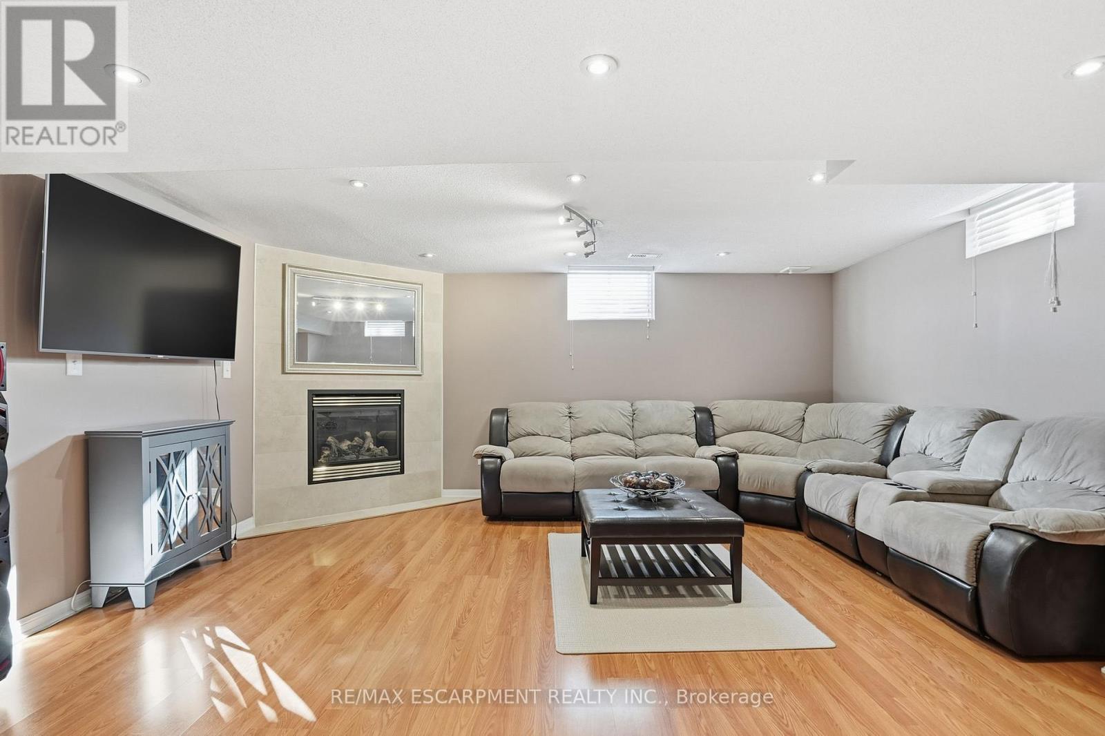 23 Mathews Court, Brantford, ON - Indoor Photo Showing Living Room With Fireplace