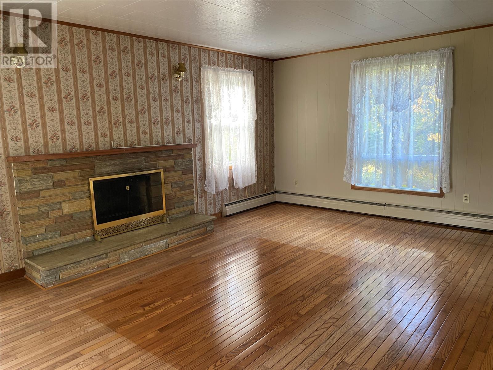 129 Roaches Line Road, Roaches Line, NL - Indoor With Fireplace