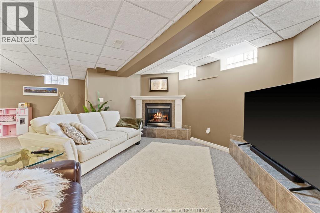 227 Clubview Drive, Amherstburg, ON - Indoor Photo Showing Basement With Fireplace