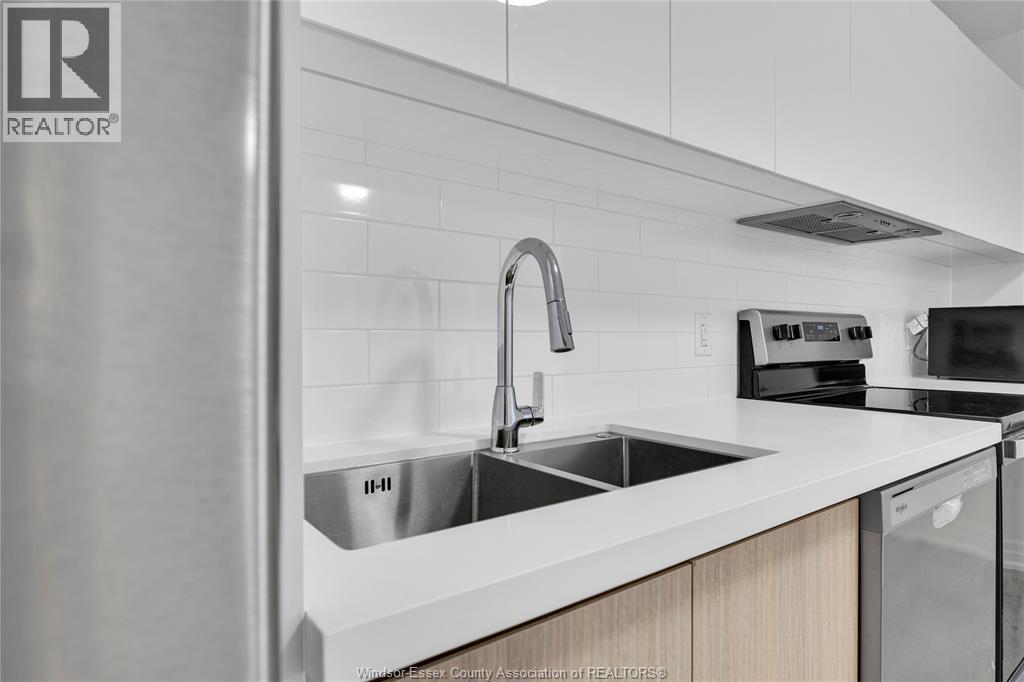 7337 Meo Boulevard Unit# 615, Lasalle, ON - Indoor Photo Showing Kitchen With Stainless Steel Kitchen With Double Sink With Upgraded Kitchen