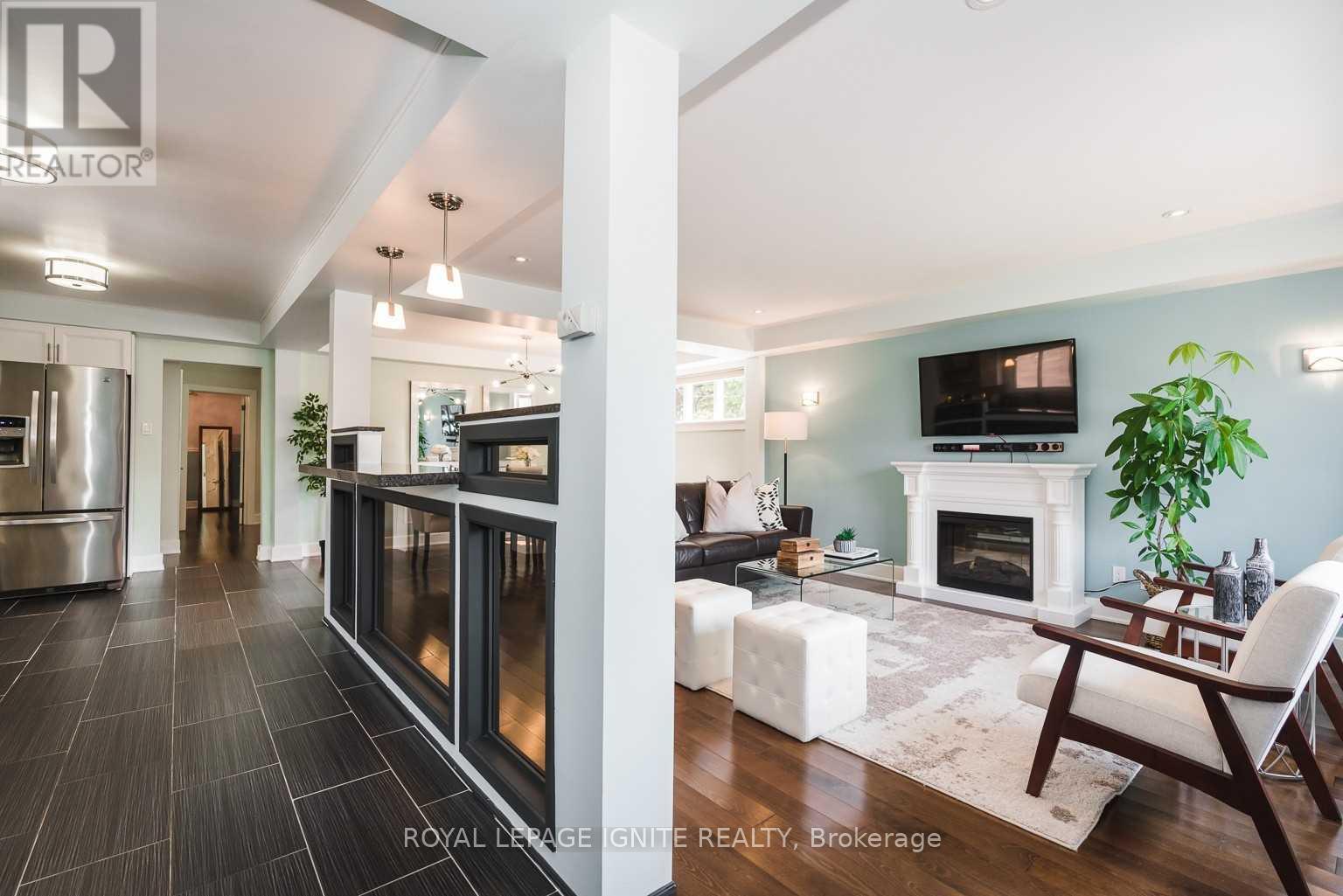 Main - 753 Morrish Road, Toronto, ON - Indoor Photo Showing Living Room With Fireplace
