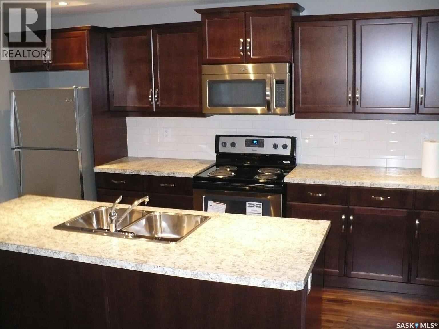 2237 Mcara Street, Regina, SK - Indoor Photo Showing Kitchen With Double Sink With Upgraded Kitchen