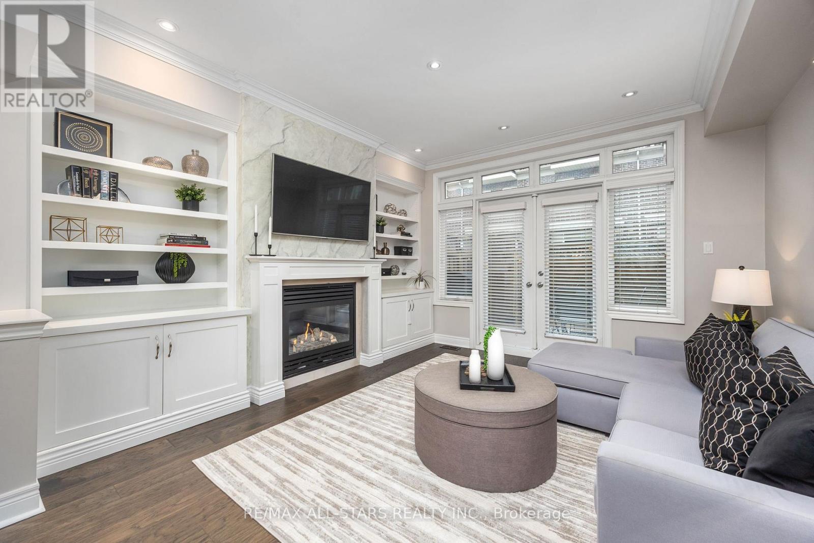 Modern Built-Ins - 114 Six Point Road, Toronto, ON - Indoor Photo Showing Living Room With Fireplace