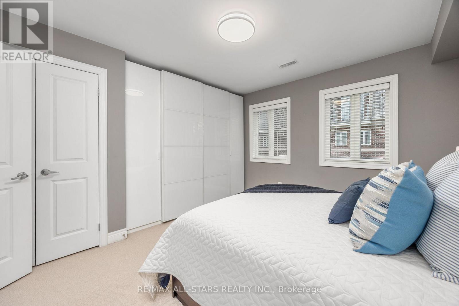 2nd Bedroom with wMain all-to-wall built in closet - 114 Six Point Road, Toronto, ON - Indoor Photo Showing Bedroom