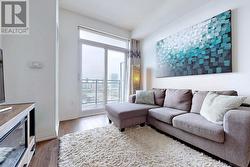 Living Room with walk-out to balcony -