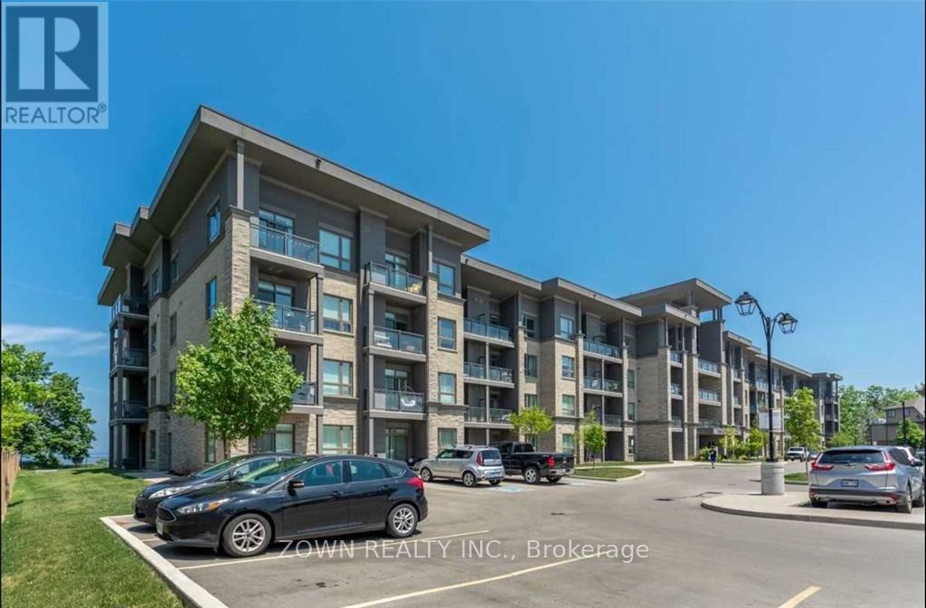 222 - 35 Southshore Crescent, Hamilton, ON - Outdoor With Balcony With Facade