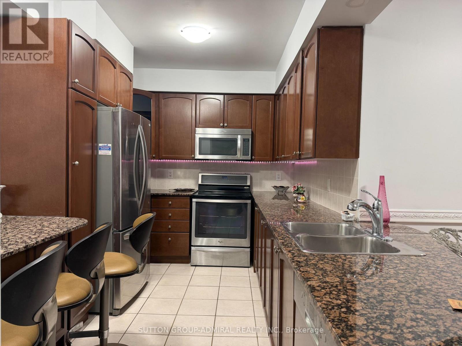 304 - 100 Promenade Circle, Vaughan, ON - Indoor Photo Showing Kitchen With Stainless Steel Kitchen With Double Sink