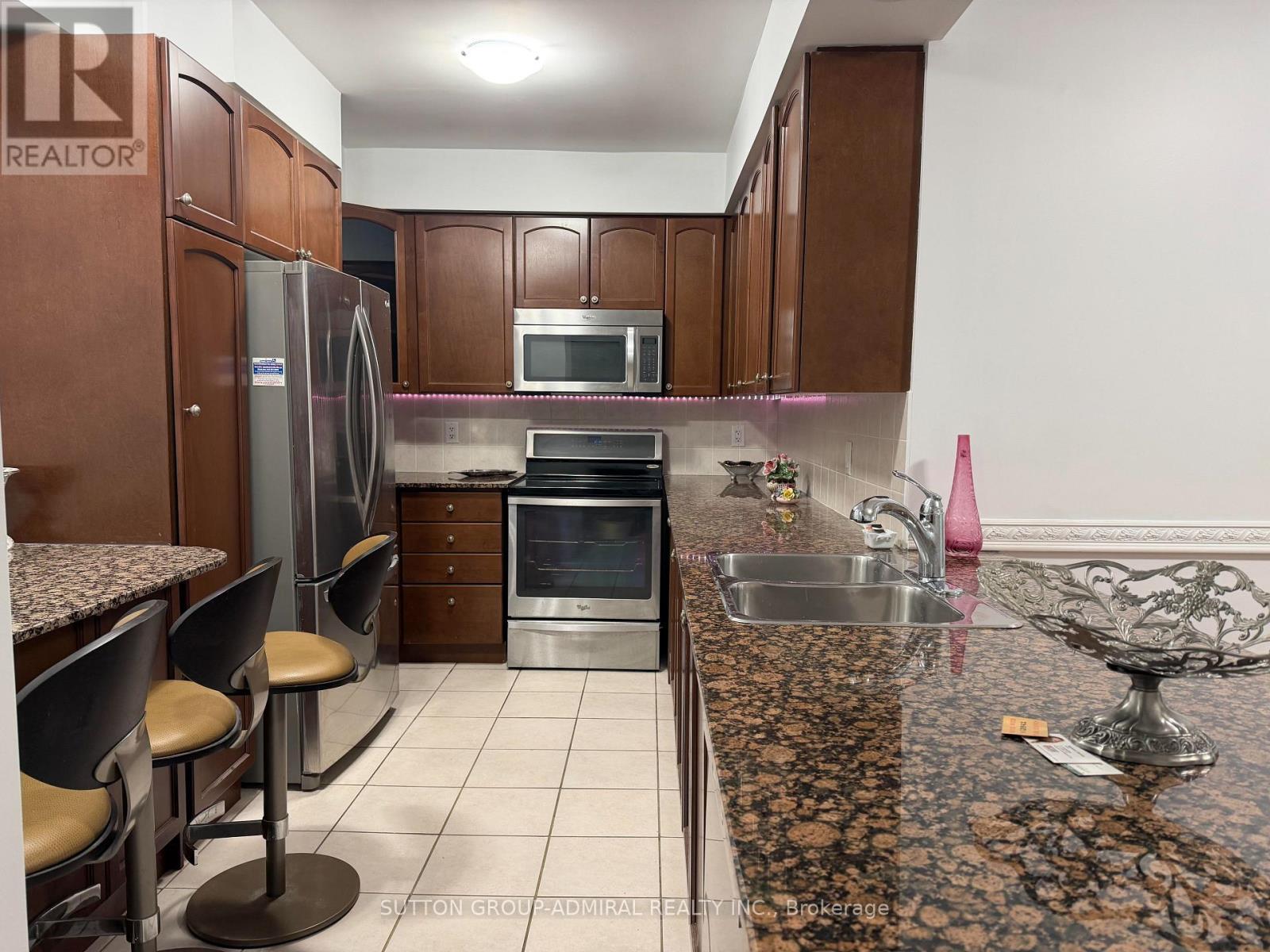 304 - 100 Promenade Circle, Vaughan, ON - Indoor Photo Showing Kitchen With Stainless Steel Kitchen With Double Sink