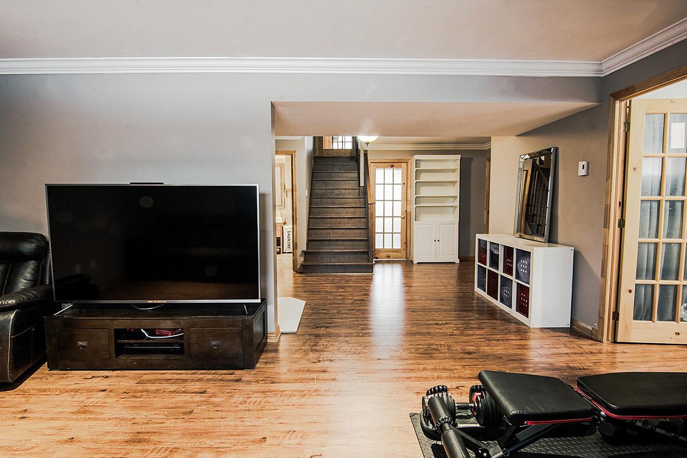 Family room - 165 Rue Des Érables, Carignan, QC - Indoor Photo Showing Other Room