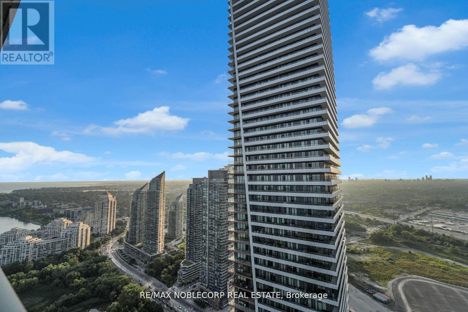 4202 - 20 Shore Breeze Drive, Toronto, ON - Outdoor With Facade