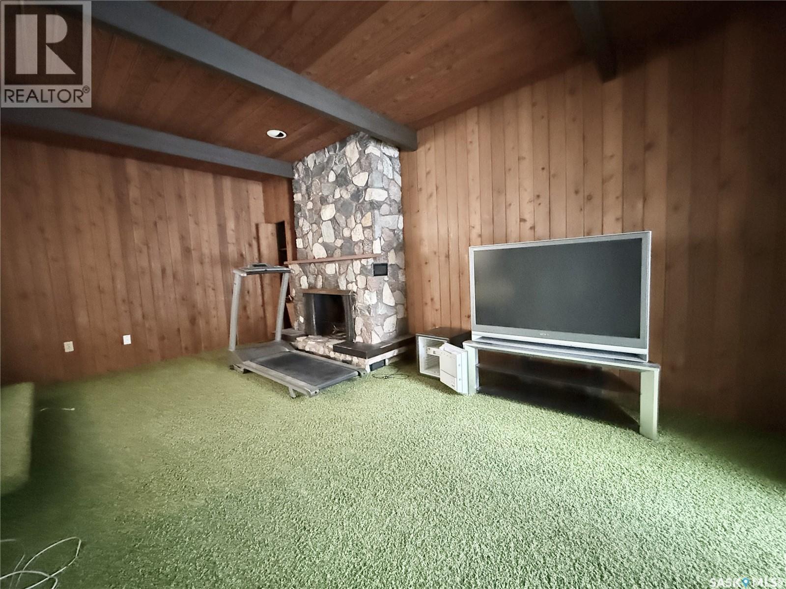 340 Ross Street, Lumsden, SK - Indoor Photo Showing Other Room With Fireplace