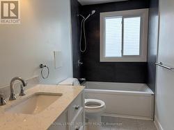 Brand-new vanity with quartz countertop -