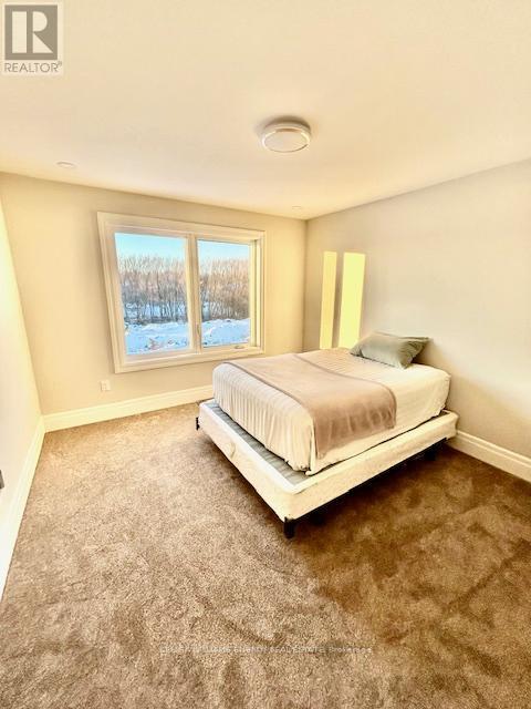 103 Buchanan Avenue, Prince Edward County (Picton Ward), ON - Indoor Photo Showing Bedroom