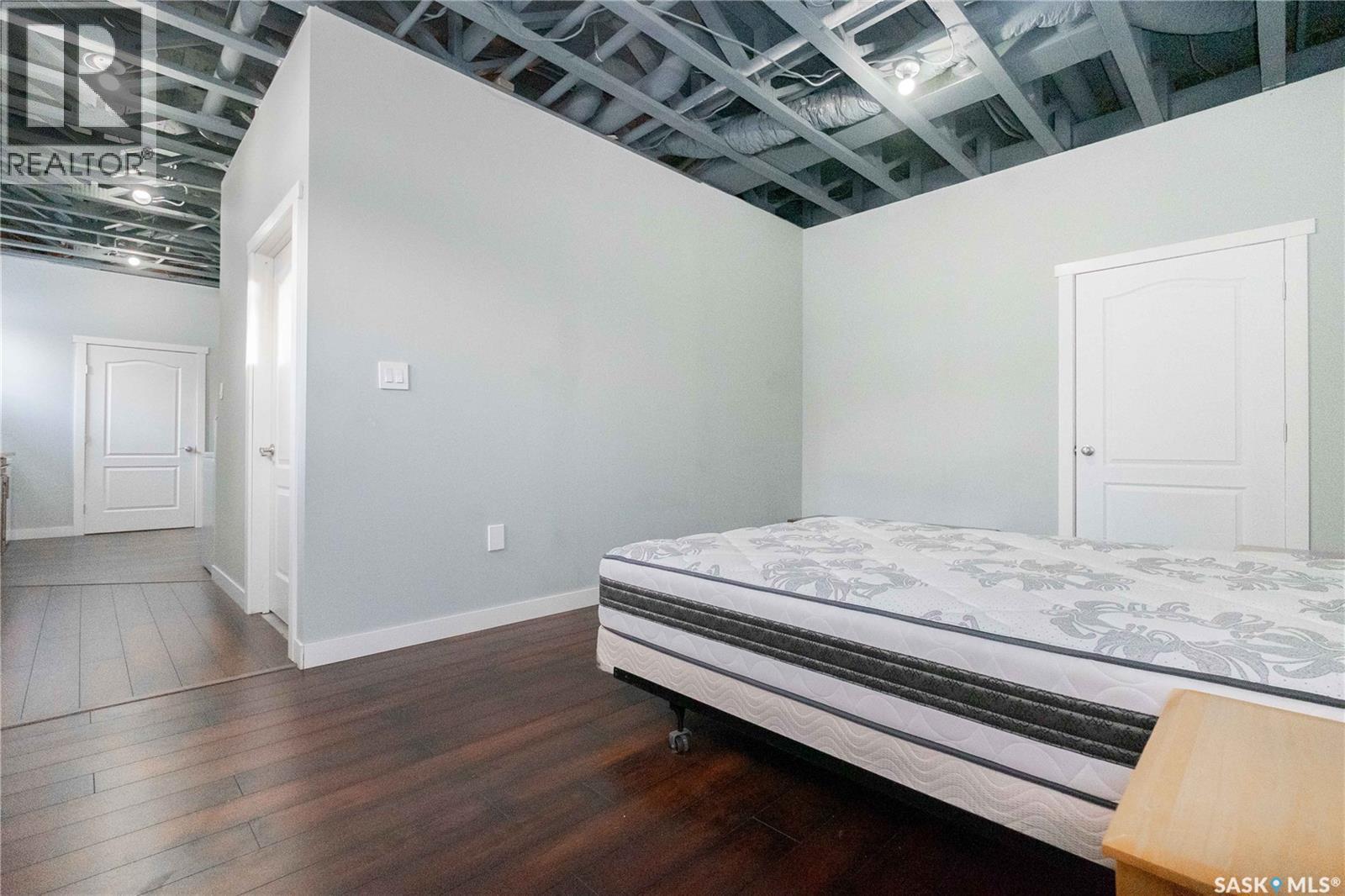 143 6Th Street, Pilot Butte, SK - Indoor Photo Showing Bedroom
