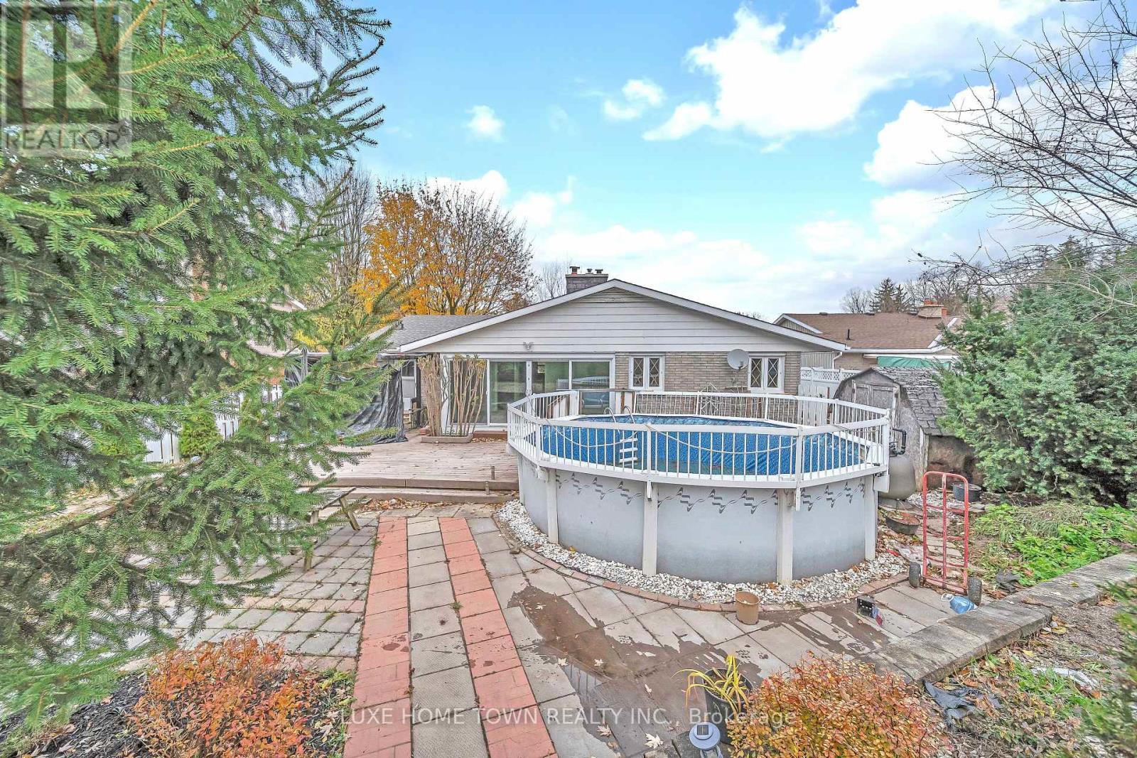 5 Centennial Drive, Brockton, ON - Outdoor With Above Ground Pool