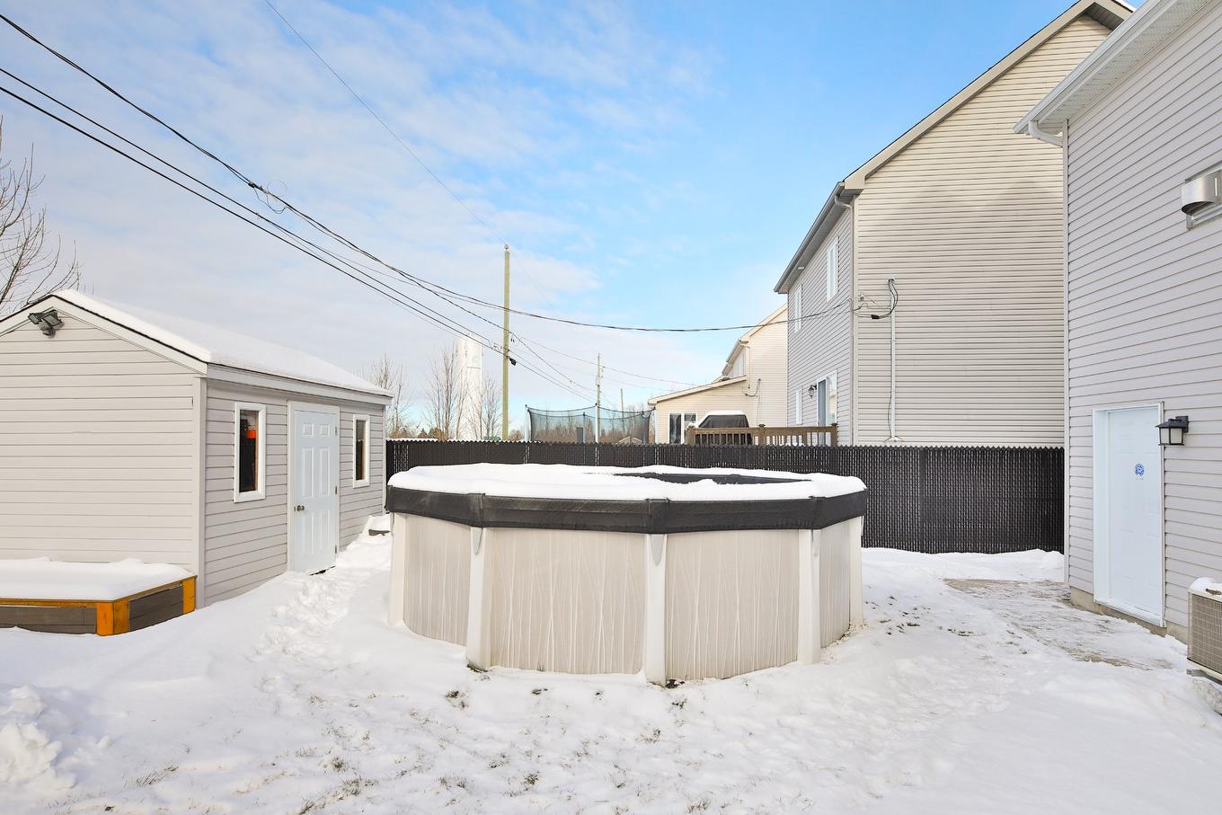 Pool - 9 Rue Cloutier, Saint-Constant, QC - Outdoor With Above Ground Pool With Exterior