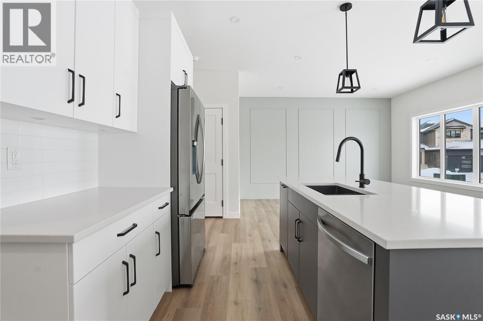 211 Sharma Lane, Saskatoon, SK - Indoor Photo Showing Kitchen With Upgraded Kitchen