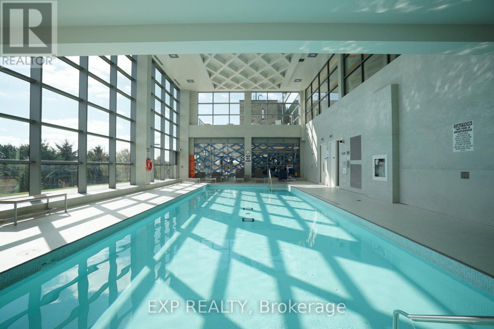 1205 - 4633 Glen Erin Drive, Mississauga, ON - Indoor Photo Showing Other Room With In Ground Pool