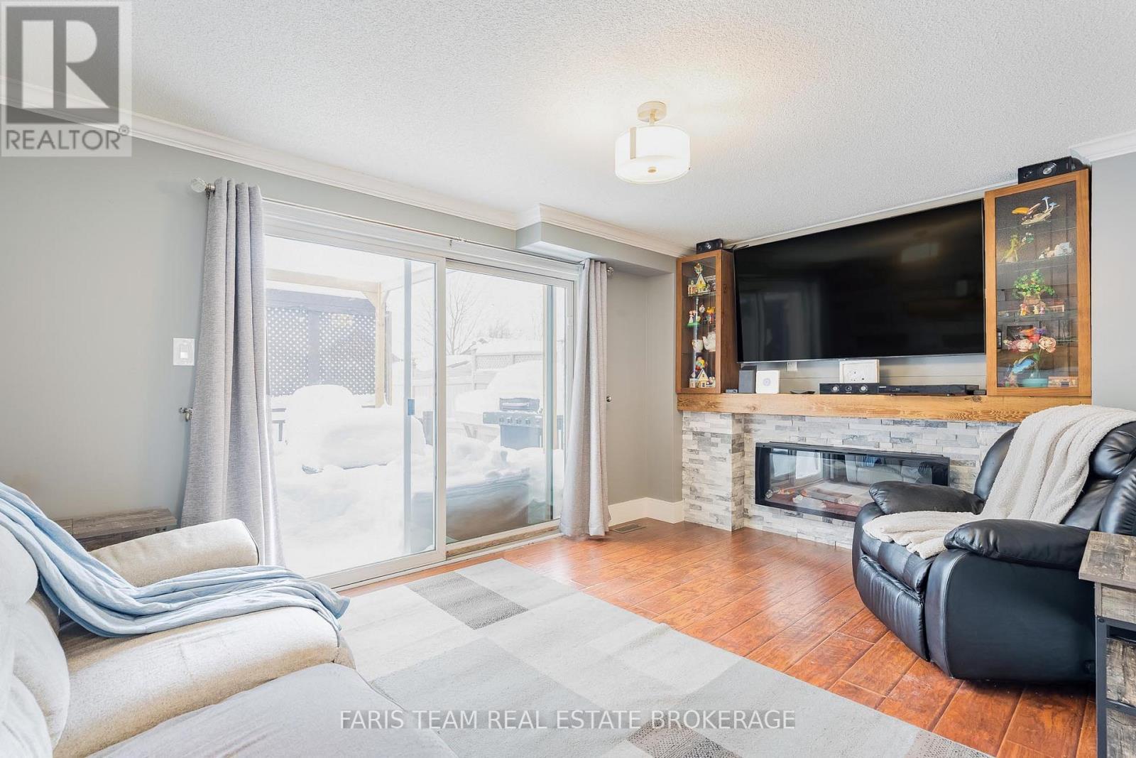 28 Raymond Crescent, Barrie, ON - Indoor Photo Showing Living Room With Fireplace