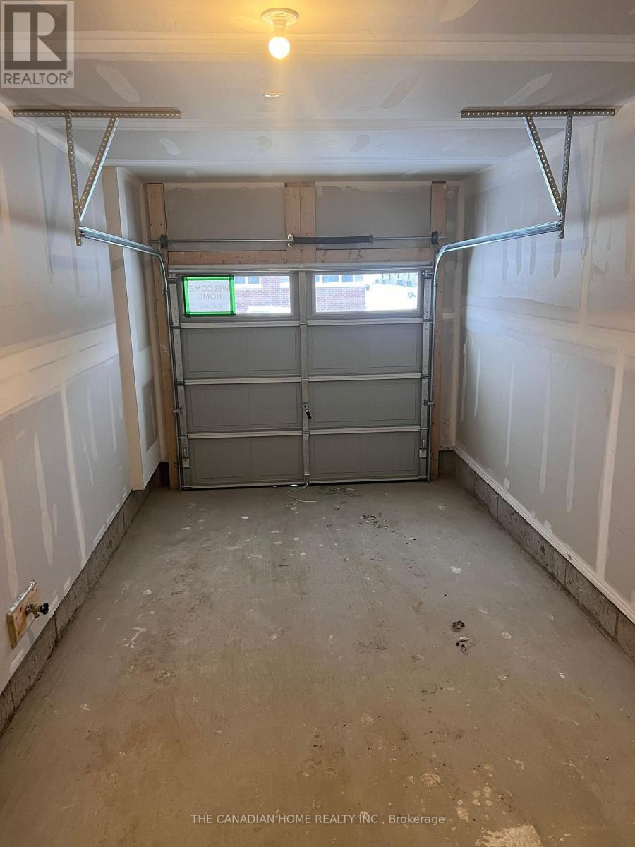 153 Ryan Reynolds Way, Ottawa, ON - Indoor Photo Showing Garage
