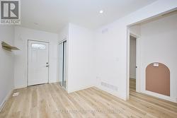 View of the entry from the living room. -