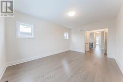 Primary Bedroom w/ Double Walk-in Closets -