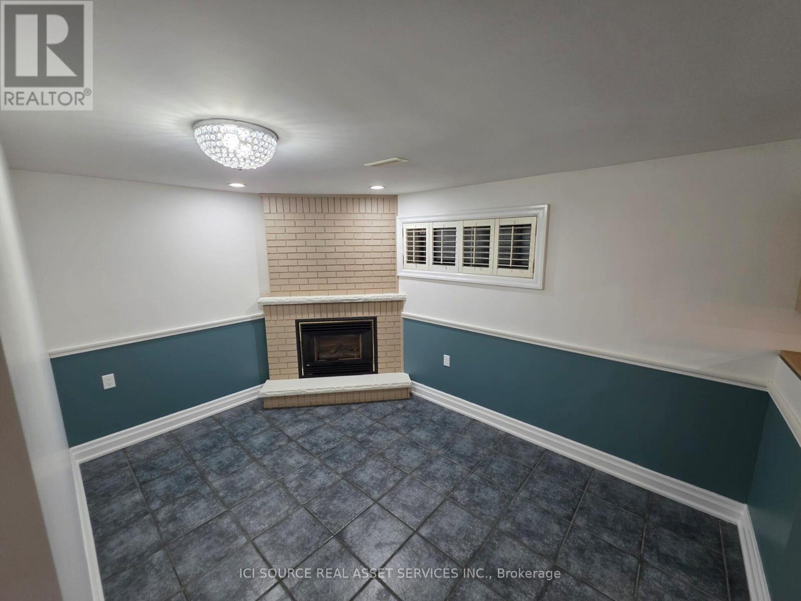 Basement - 33 Broomfield Drive, Toronto, ON - Indoor Photo Showing Other Room With Fireplace